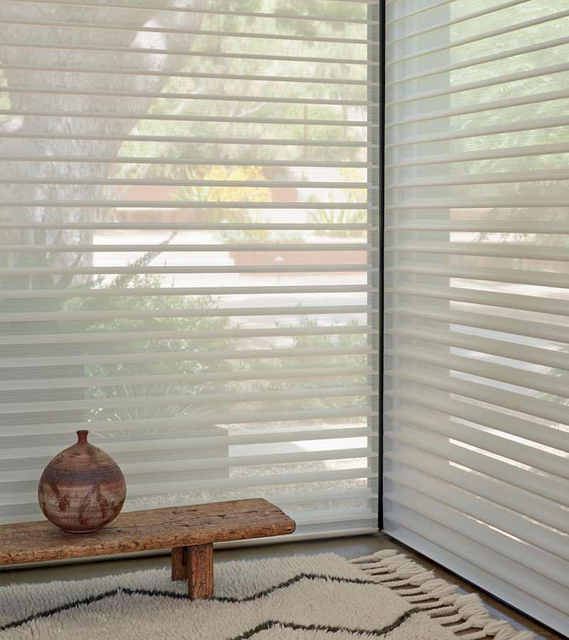 silhouette-corner-detail-of-large-windows-hunter-douglas-skyline-window-coverings